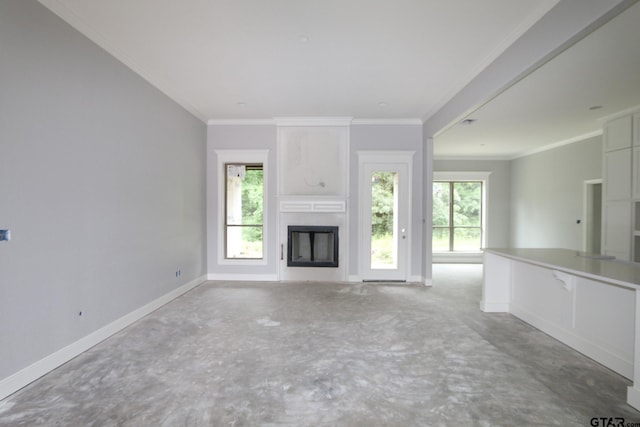 11941 Gillian Ct, Tyler, TX 75703 - unfurnished living room with baseboards, ornamental molding, and a fireplace