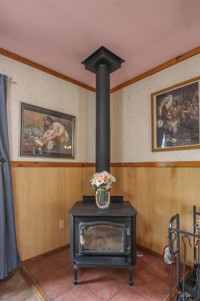 2391 Fm 16 W, Tyler, TX 75706 - detailed view of a wood stove, wainscoting, and wooden walls
