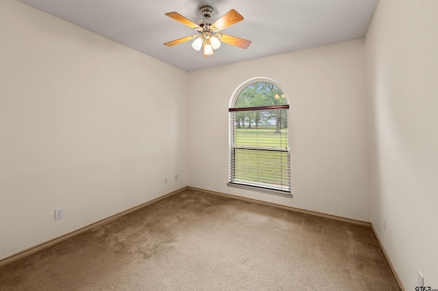 1745 County Road 1570, Alba, TX 75410 - spare room with carpet, a ceiling fan, and baseboards