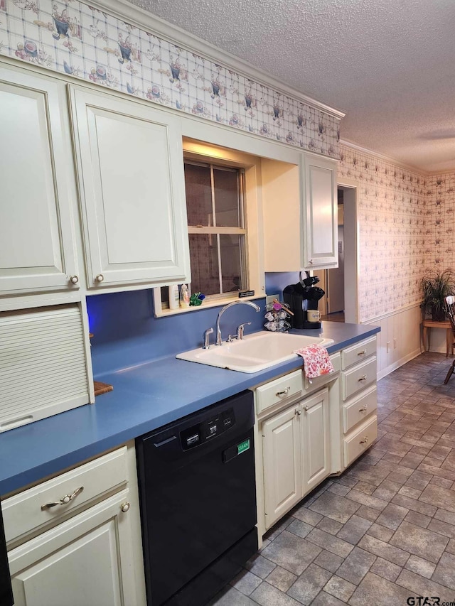 kitchen with crown molding, black dishwasher, sink, and a textured ceiling