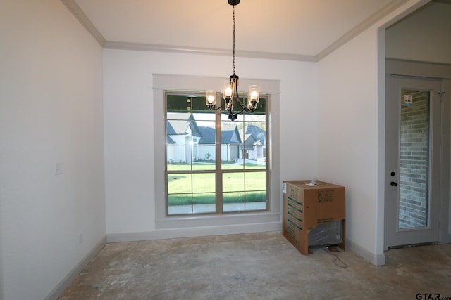 dining area featuring plenty of natural light, concrete flooring, crown molding, and a chandelier