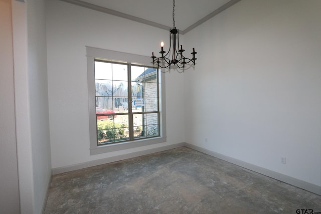 unfurnished room featuring a chandelier