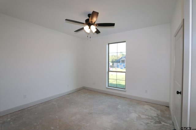 unfurnished room with ceiling fan