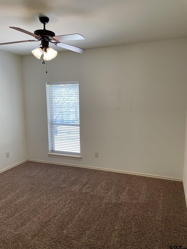 11200 Fox Trl, Flint, TX 75762 - carpeted empty room featuring a ceiling fan and baseboards