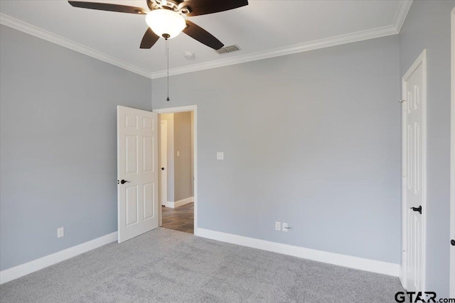 unfurnished room with light carpet, crown molding, and ceiling fan