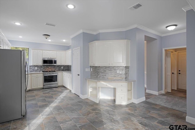 kitchen with white cabinetry, appliances with stainless steel finishes, backsplash, and ornamental molding