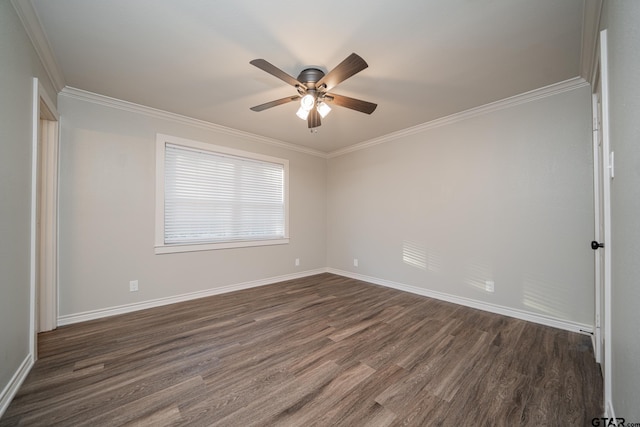 empty room with dark hardwood / wood-style flooring, ornamental molding, and ceiling fan