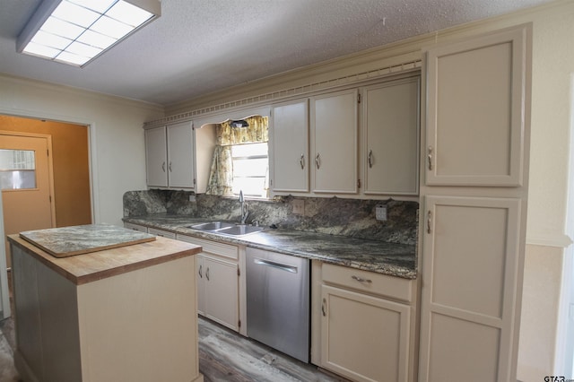 107 Clover Dr, Gun Barrel City, TX 75156 - kitchen featuring a sink, stainless steel dishwasher, wood counters, light wood-type flooring, and tasteful backsplash