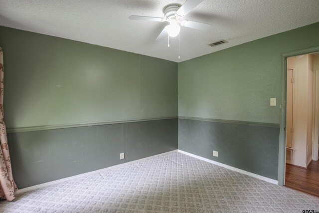 107 Clover Dr, Gun Barrel City, TX 75156 - carpeted empty room featuring ceiling fan, a textured ceiling, and baseboards