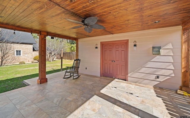 view of patio featuring ceiling fan