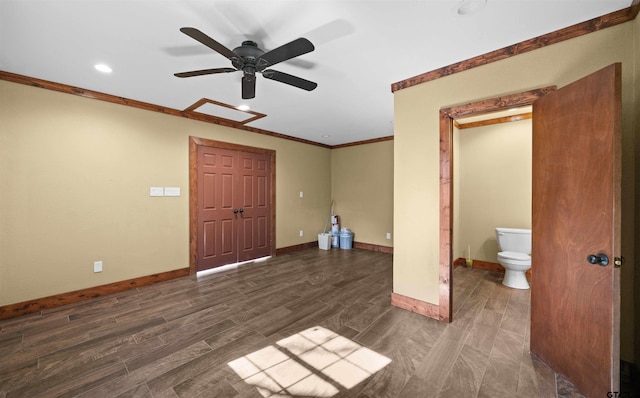 interior space with dark hardwood / wood-style flooring, ceiling fan, and ornamental molding