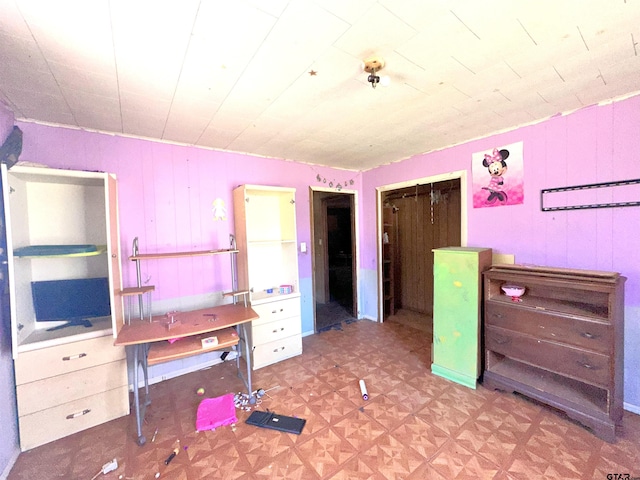 bedroom featuring a closet and tile patterned floors