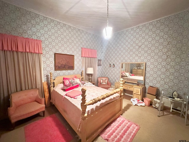 carpeted bedroom featuring wallpapered walls