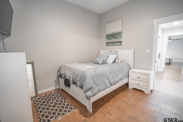 bedroom with light hardwood / wood-style flooring