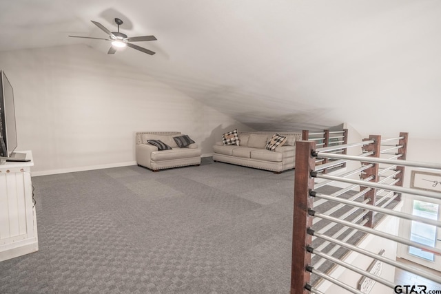 unfurnished living room with ceiling fan, lofted ceiling, and carpet