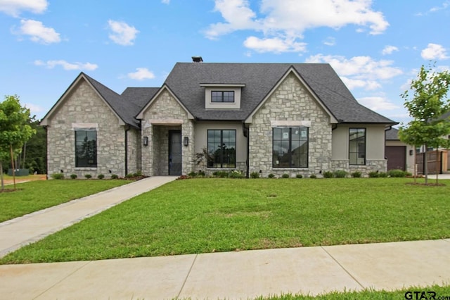 3312 Forest Ct, Tyler, TX 75703 - view of front of house with stone siding, a front lawn, roof with shingles, and stucco siding