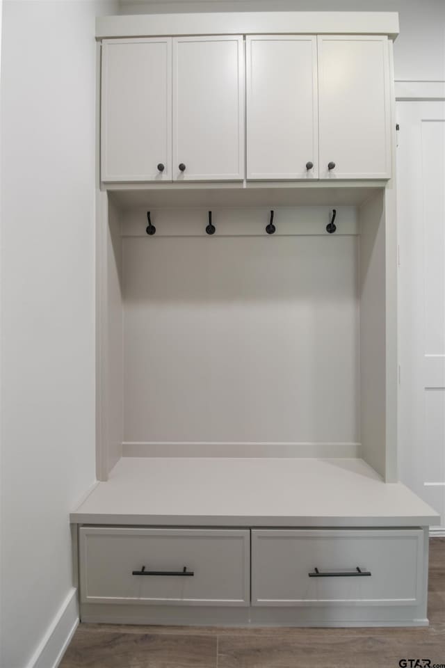 3312 Forest Ct, Tyler, TX 75703 - mudroom featuring wood finished floors and baseboards