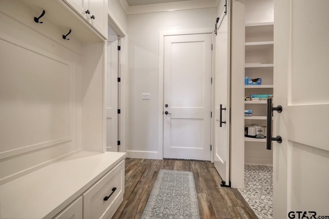 mudroom featuring wood-type flooring