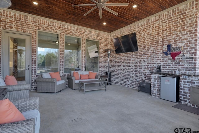 view of patio with an outdoor hangout area and ceiling fan