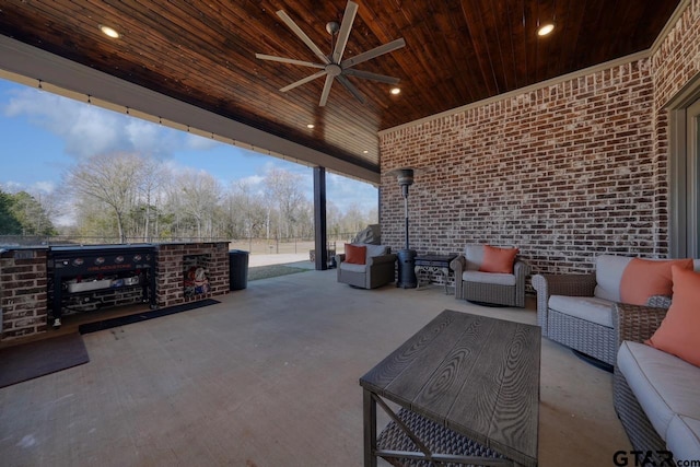 view of patio / terrace with ceiling fan and outdoor lounge area