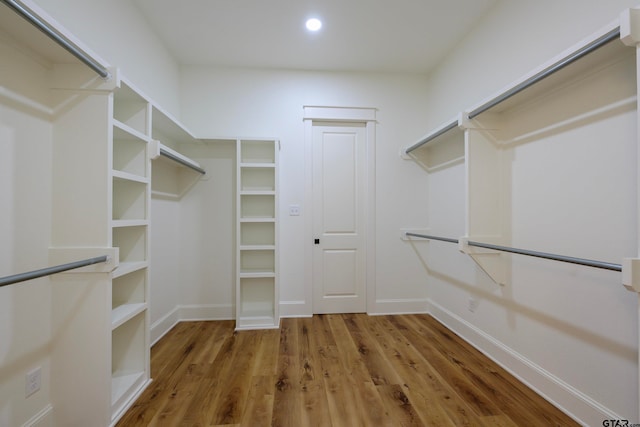 walk in closet featuring wood-type flooring