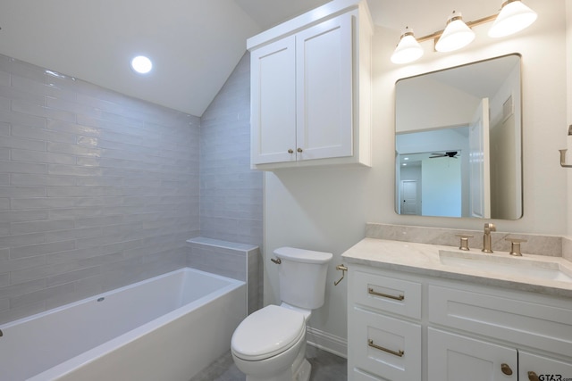 full bathroom with vanity, tiled shower / bath combo, toilet, lofted ceiling, and ceiling fan