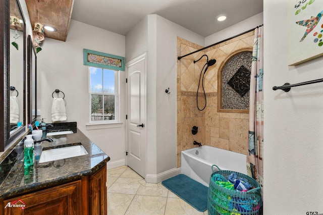 bathroom with shower / bath combination with curtain, vanity, and tile patterned flooring