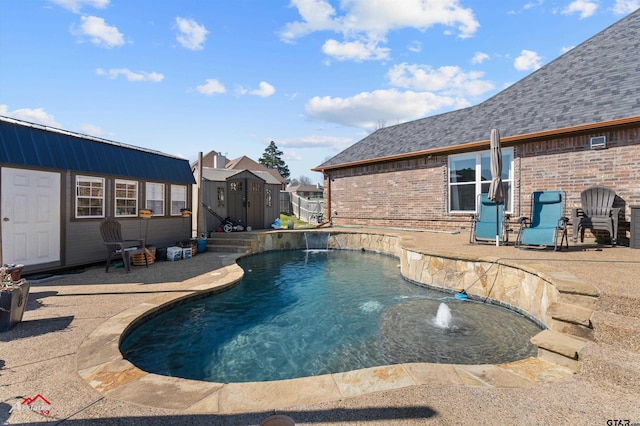 view of swimming pool with a patio area and pool water feature