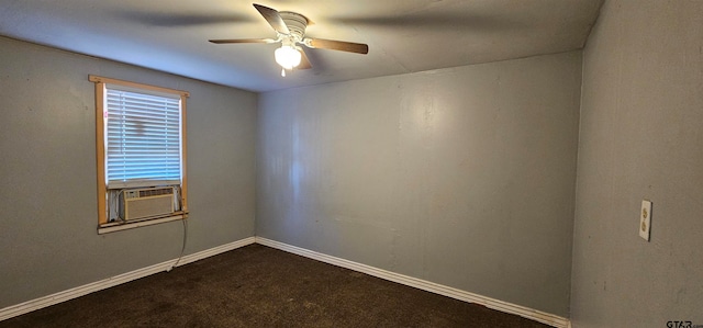 spare room with ceiling fan, dark colored carpet, and cooling unit