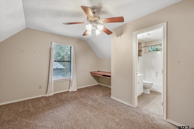 141 Green Mesa Ln, Holly Lake Ranch, TX 75765 - bonus room with carpet flooring, lofted ceiling, ceiling fan, a textured ceiling, and a desk