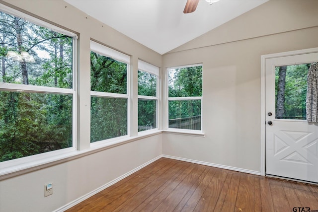 141 Green Mesa Ln, Holly Lake Ranch, TX 75765 - spare room with lofted ceiling, baseboards, a ceiling fan, and wood-type flooring