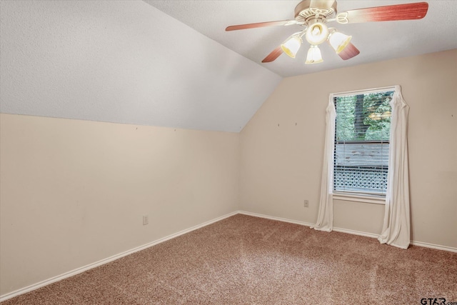 141 Green Mesa Ln, Holly Lake Ranch, TX 75765 - additional living space with ceiling fan, vaulted ceiling, carpet flooring, and baseboards