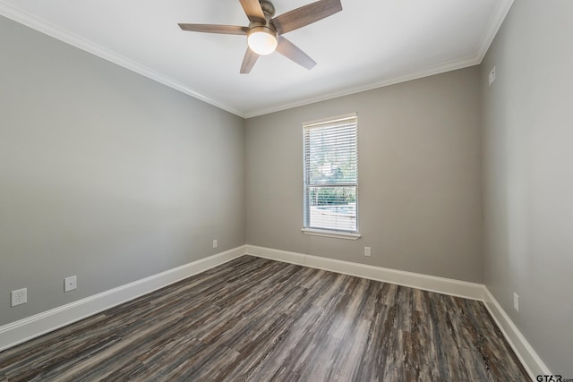 spare room featuring dark wood-type flooring, ceiling fan, and ornamental molding