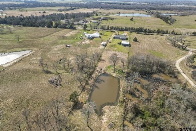 bird's eye view with a water view and a rural view