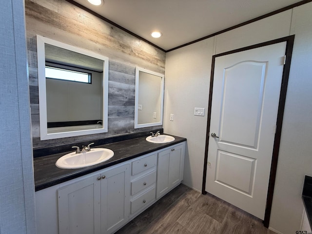 bathroom featuring hardwood / wood-style flooring and vanity