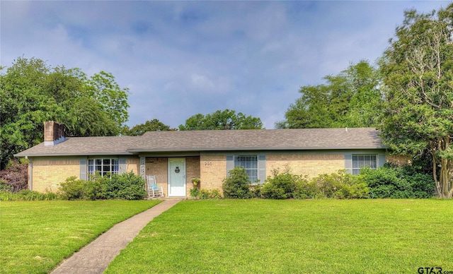 ranch-style house with a front yard