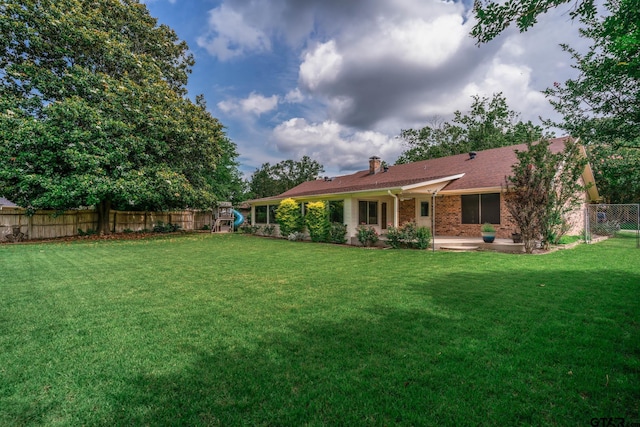 1206 Corey Dr, Whitehouse, TX 75791 - view of yard featuring a patio area