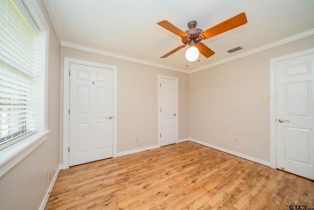 1206 Corey Dr, Whitehouse, TX 75791 - unfurnished bedroom with light wood-style floors, baseboards, ornamental molding, and a ceiling fan