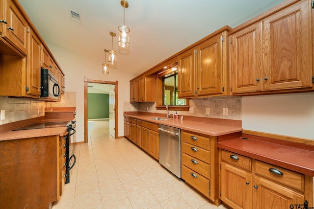 1206 Corey Dr, Whitehouse, TX 75791 - kitchen featuring dishwasher, tasteful backsplash, a sink, black microwave, and light tile patterned flooring