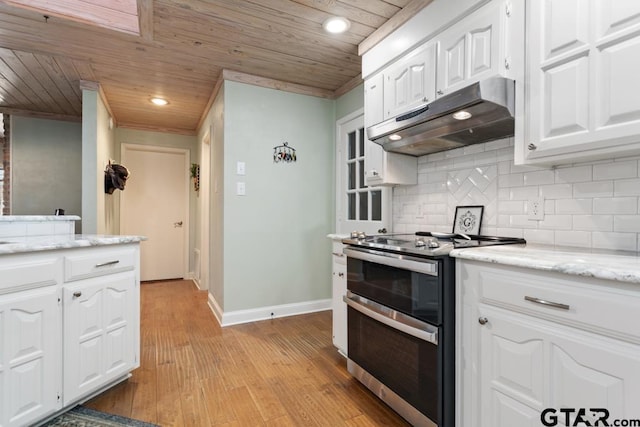 kitchen with white cabinets, double oven range, wooden ceiling, and decorative backsplash