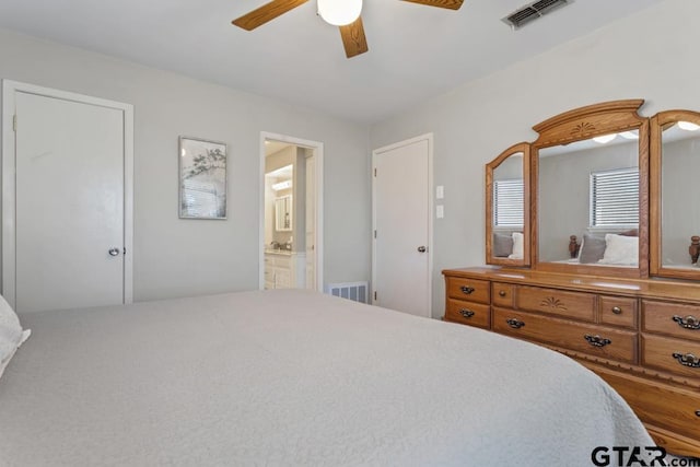 bedroom featuring connected bathroom and ceiling fan