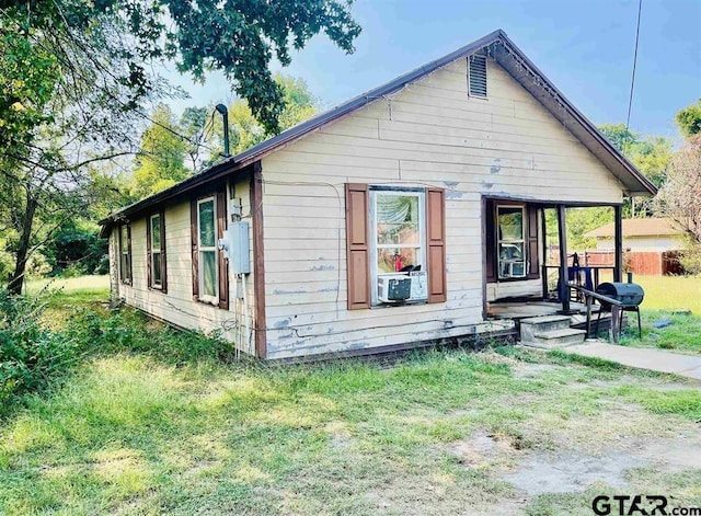 view of property exterior with cooling unit