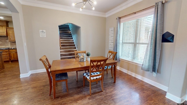 dining area with a healthy amount of sunlight, arched walkways, dark wood-type flooring, and crown molding