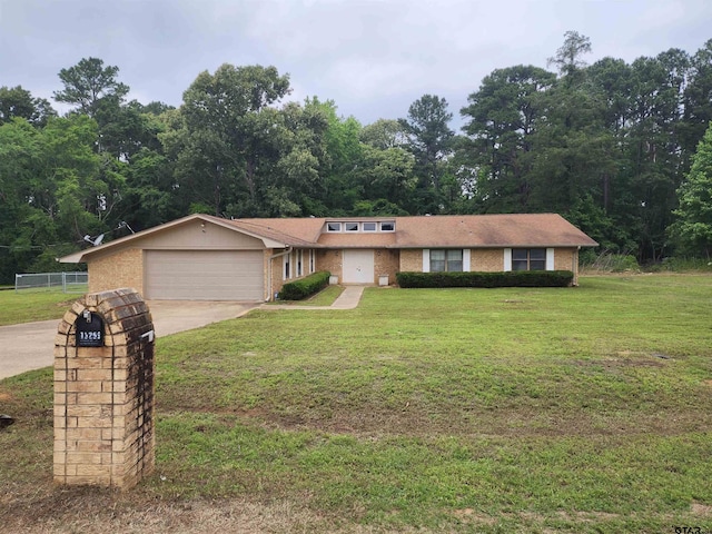 13259 County Road 2220, Whitehouse, TX 75791 - view of front of home featuring a garage, brick siding, and driveway