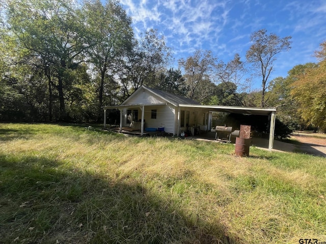 exterior space with a lawn