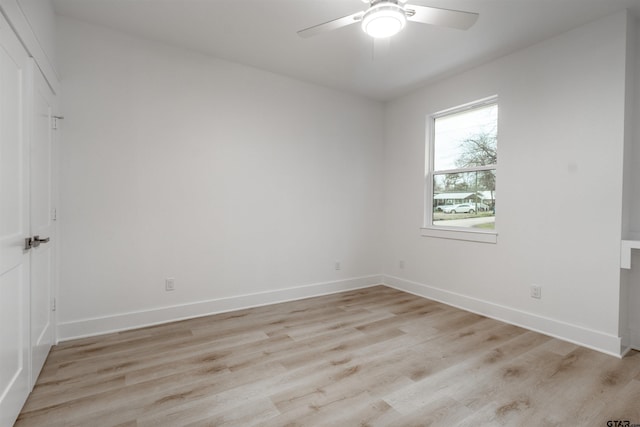 unfurnished room with ceiling fan and light hardwood / wood-style floors