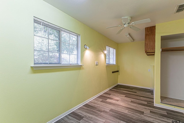 250 Autumn Wood Trl, Holly Lake Ranch, TX 75765 - unfurnished bedroom with wood finished floors, a closet, baseboards, and ceiling fan