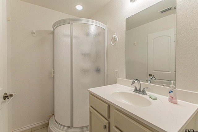 250 Autumn Wood Trl, Holly Lake Ranch, TX 75765 - full bathroom featuring a shower stall, vanity, recessed lighting, and tile patterned flooring