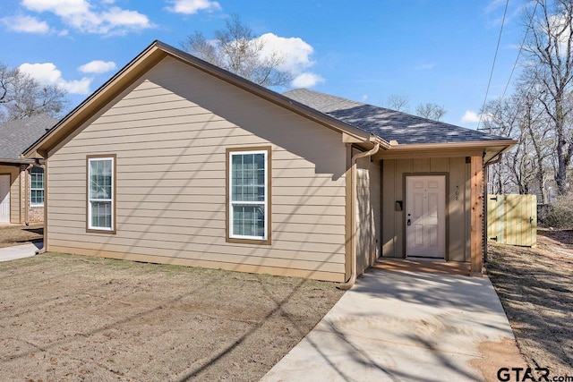 view of front of home with roof with shingles