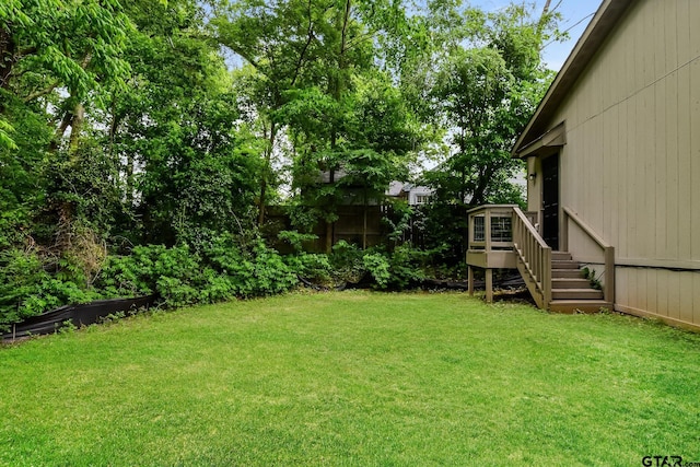 613 S Baxter, Tyler, TX 75701 - view of yard with stairs and a wooden deck